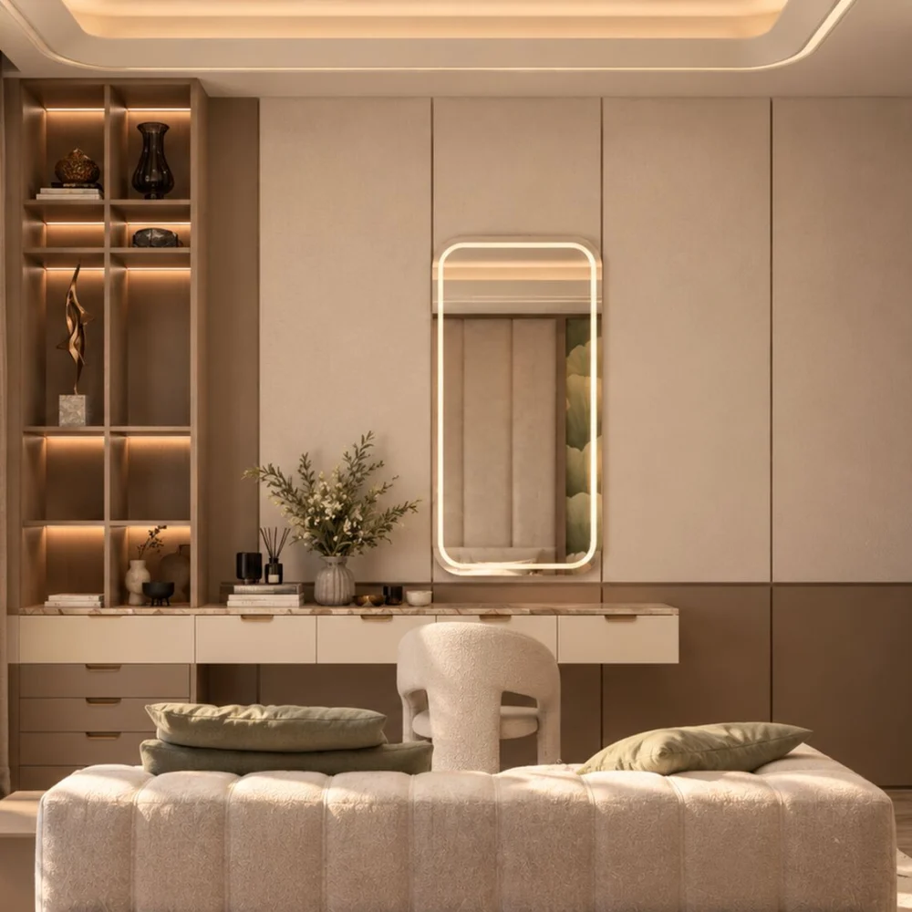Dressing table with a lit mirror and display shelving beside the window in a Hatta villa master bedroom