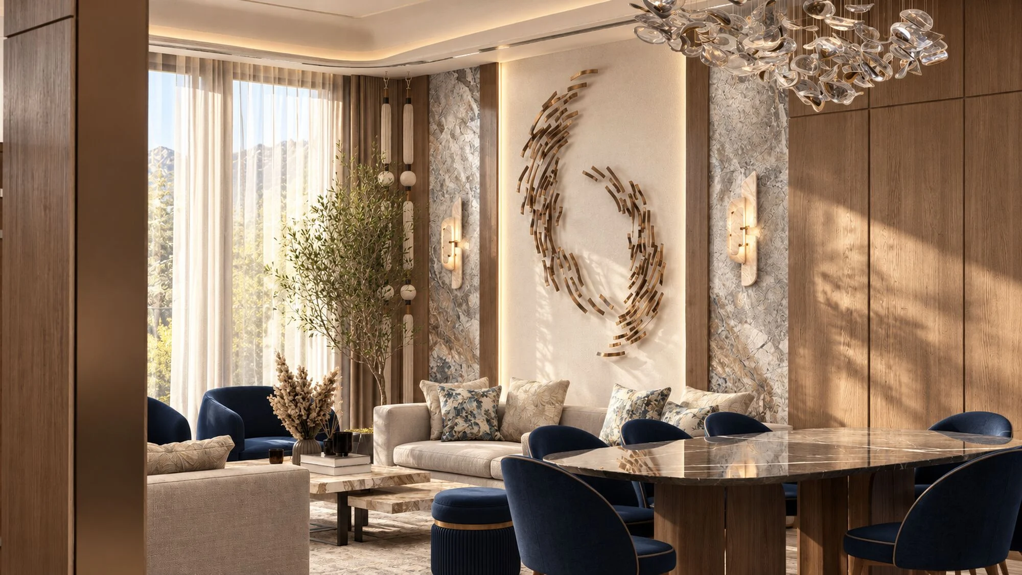 Living room with a brass wall sculpture, an olive tree and the dining table in a Hatta villa by Tohfa