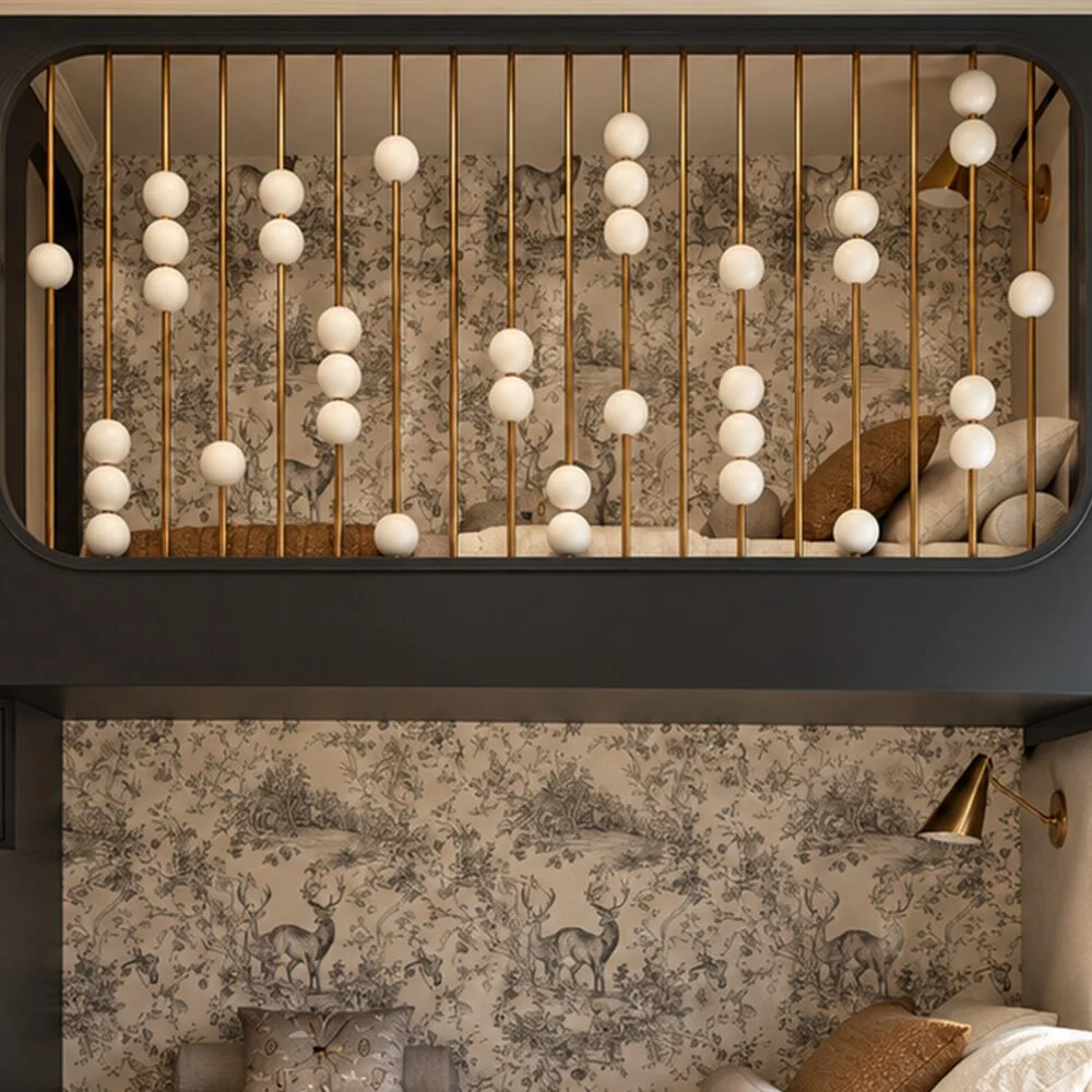 Brass bed rail threaded with wooden beads like an abacus around a raised bed in an Istanbul apartment by Tohfa